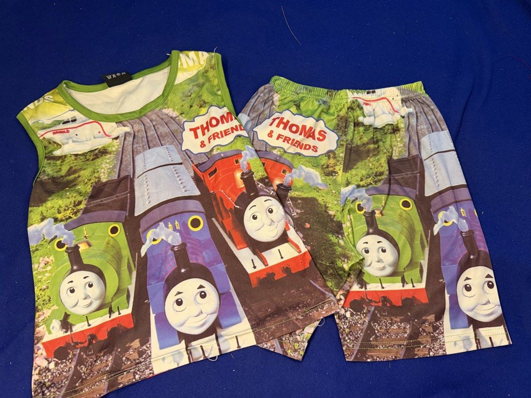Thomas & Friends Tank Top and Shorts Set (Category: Babies & Kids Fashion) located in Makati City. Submitted by prelovedkitty13 (Listing ID 1433094933, Image 1). Description: - Thomas & Friends tank top and shorts set. - Features a colorful print of Thomas the Tank Engine and friends. - Includes a sleeveless top and matching shorts. - Ideal for young fans. - Made from comfortable fabric..