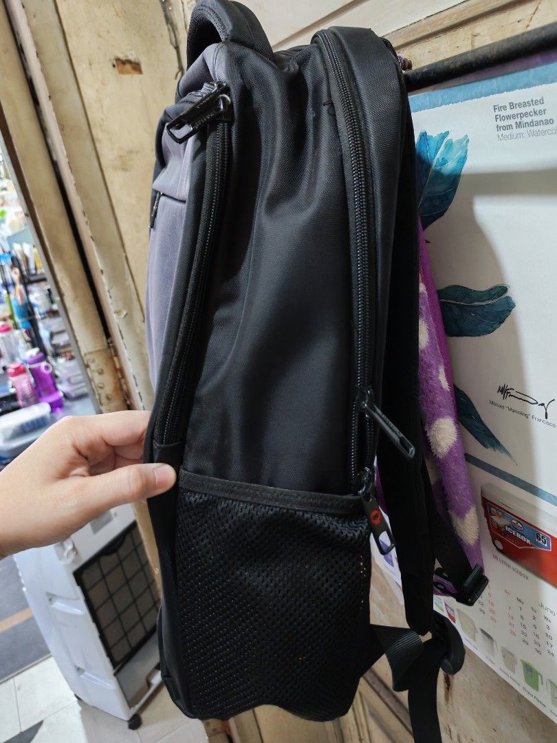 Tigernu T-B3105 Black Laptop Backpack (Category: Backpacks) located in Quezon City. Submitted by iamsy25 (Listing ID 1433047238, Image 2). Description: - Black Tigernu backpack - Padded back panel for comfort - Adjustable shoulder straps - Multiple compartments for organization - Laptop compartment - Side mesh pocket - Front pocket with red zipper - Additional interior pockets - Top handle for easy carrying In good condition, only used a few time