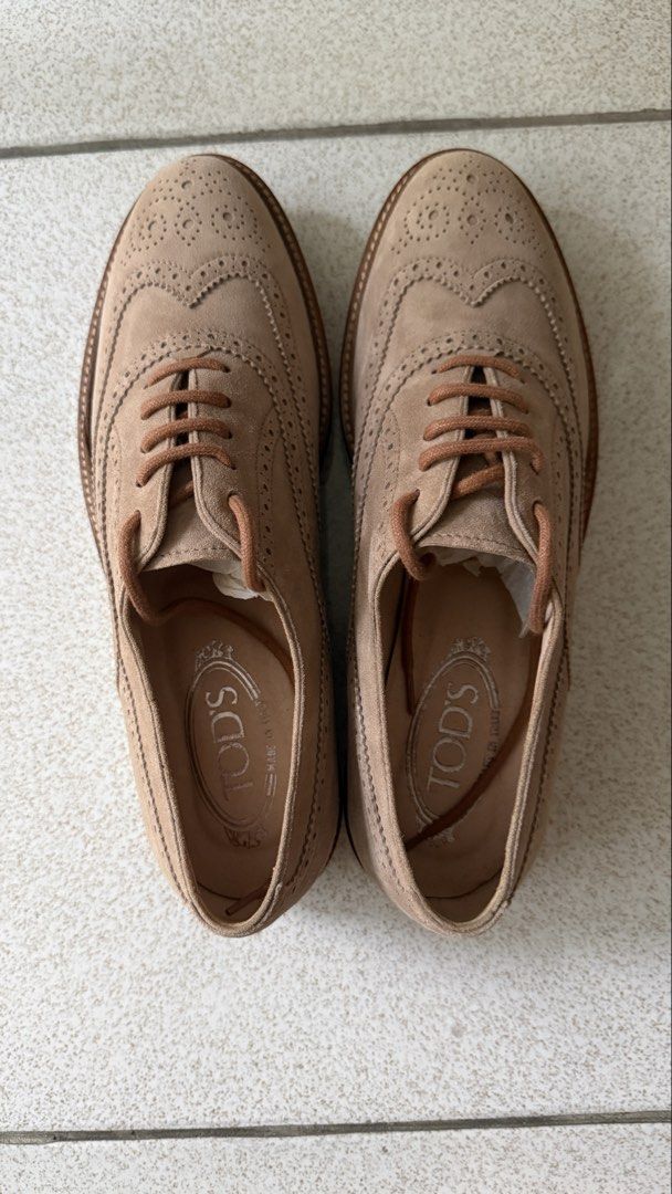 Tod's Suede Shoes (Category: Loafers) located in Quezon City. Submitted by _daynes (Listing ID 1433086495, Image 1). Description: Comes with dustbag.
