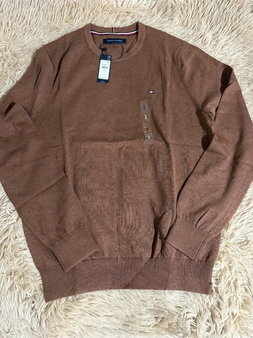Tommy Hilfiger Crew Neck Sweater - Brown (Category: Coats, Jackets and Outerwear) located in Pateros City. Submitted by armcandystuff (Listing ID 1433044825, Image 1). Description: - Tommy Hilfiger crew neck sweater - Color: Brown - Size: Small on tag but can fit up to Large - Features Tommy Hilfiger logo - Ribbed hem and cuffs - Knit fabric.