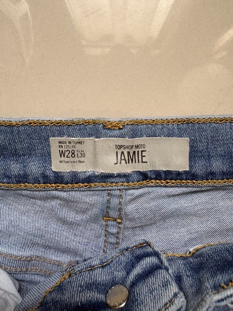 Topshop Denin Jeans (Category: Jeans) located in Quezon City. Submitted by issa1221 (Listing ID 1433097617, Image 2). Description: - Topshop Moto Jamie Jeans - Light wash - High-waisted - Distressed knee detailing - Size: W28 L30 - Made in Turkey - Everyday wear.