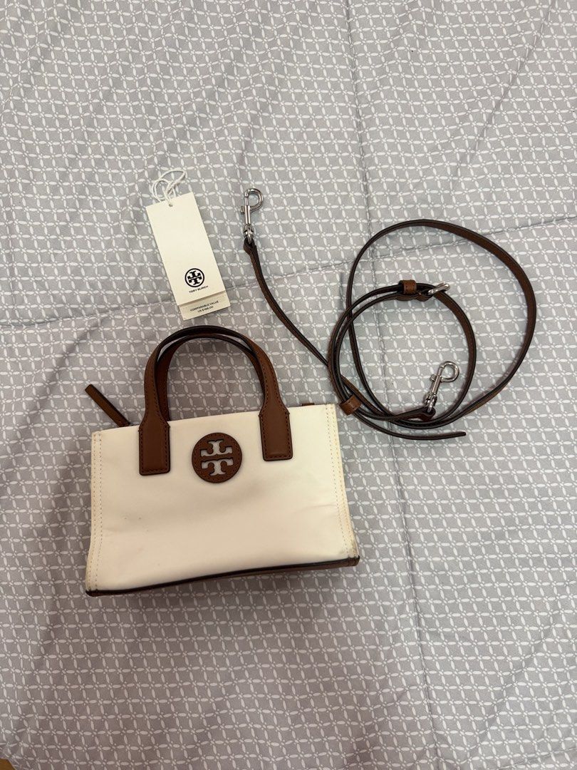 Tory Burch Ella Nylon Mini Tote (Category: Luxury Bags & Wallets) located in Dumangas. Submitted by tincajipo16 (Listing ID 1433021227, Image 1). Description: Worn once with minimal flaws due to storage. Like new condition, inside of the bag is clean. .