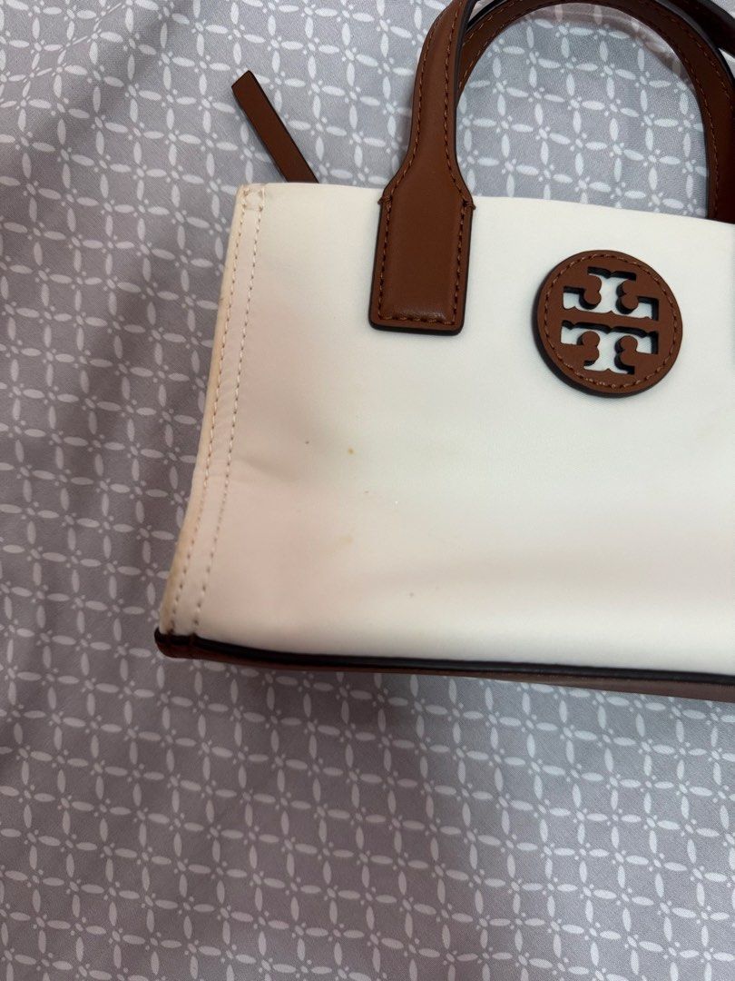 Tory Burch Ella Nylon Mini Tote (Category: Luxury Bags & Wallets) located in Dumangas. Submitted by tincajipo16 (Listing ID 1433021227, Image 3). Description: Worn once with minimal flaws due to storage. Like new condition, inside of the bag is clean. .
