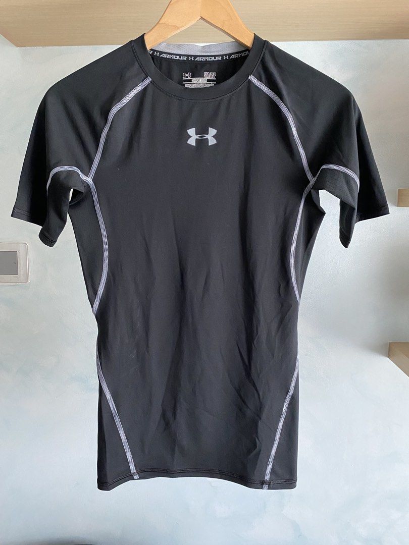 Under Armour Heat Gear Compression Top Short Sleeves (Category: Activewear) located in Taguig. Submitted by reviverevolution (Listing ID 1433092148, Image 2). Description: - Under Armour Heat Gear Compression Top Short Sleeves - Color: Black/Silver - Size: Small - Measurement: pit to pit 15 3/4 inches; length 25 inches - Payment Methods: GCash / BPI / BDO - Delivery via LBC / J&T pick-up / Lalamove pick-up. Delivery fee and pick-up booking c/o bu