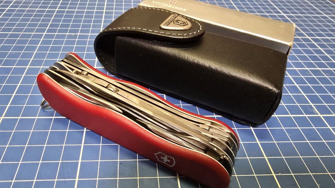 Victorinox Work Champ Swiss Army Knife (Category: Luxury Bags & Wallets) located in Cagayan de Oro. Submitted by erwin6 (Listing ID 1433143413, Image 2). Description: - Victorinox Work Champ Swiss Army Knife - Includes original leather case with Victorinox logo - Comes with original silver Victorinox box.