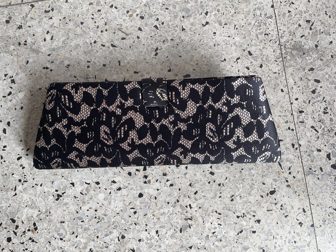 Vintage black lace clutch (Category: Clutches) located in Quezon City. Submitted by liama (Listing ID 1433022058, Image 2). Description: Roomy enough for phone, lipstick Quick open/ close snap Used once only (i dont attend a lot of formal events anymore) <GCash; buyer books/pays for pick up : QC: EDSA-GMA area>.