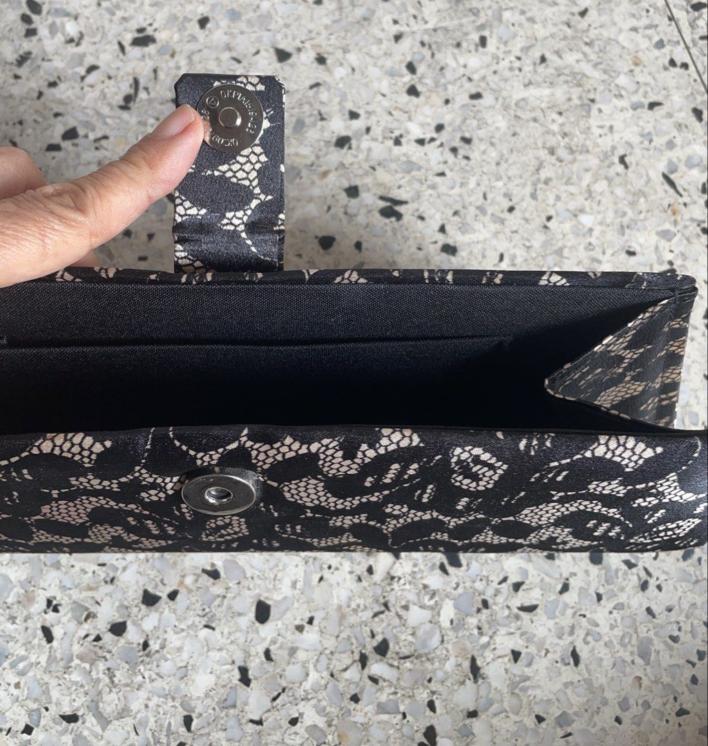 Vintage black lace clutch (Category: Clutches) located in Quezon City. Submitted by liama (Listing ID 1433022058, Image 3). Description: Roomy enough for phone, lipstick Quick open/ close snap Used once only (i dont attend a lot of formal events anymore) <GCash; buyer books/pays for pick up : QC: EDSA-GMA area>.