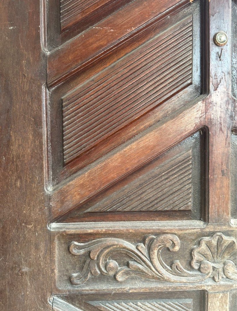 Vintage Wooden Door with Carved Details (Category: Other Home Decor) located in Quezon City. Submitted by mademoiselle_shop (Listing ID 1433051643, Image 3). Description: - 92x198cm 1970s solid wood door From 10k selling price - Vintage wooden door - Intricate carved details - Rich, dark brown color - Unique geometric design - Includes door knob and hardware - Solid wood construction - Adds vintage charm.