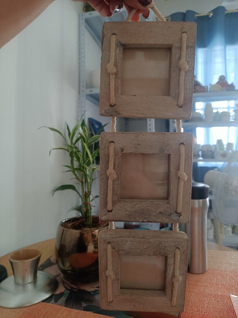 Wooden Triple Picture frame (Category: Frames & Pictures) located in Cavite. Submitted by hammy18 (Listing ID 1433086206, Image 1). Description: fixed price.