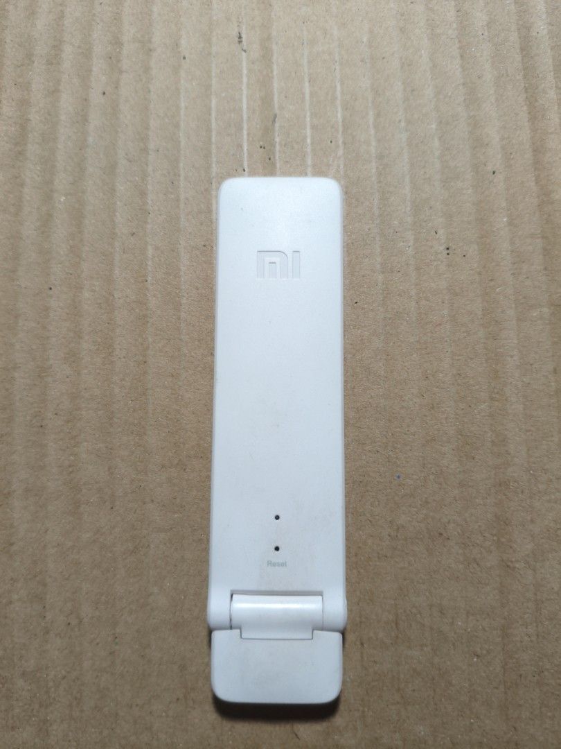 Xiaomi WiFi Repeater 2 Amplifier Extender 300mbps (Category: Networking) located in Pasig City. Submitted by coolphoenix-29ac (Listing ID 1433129977, Image 1). Description: The Xiaomi Mi Wi-Fi Repeater 2 is a compact, USB-powered device designed to extend 2.4 GHz network coverage, supporting speeds up to 300 Mbps. It features dual PCB antennas, covers multiple rooms, and connects up to 16 devices simultaneously. Setup is handled via the Mi Home a