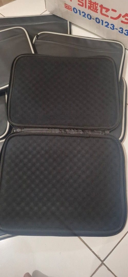 ZeroShock Laptop Sleeve Waterproof Japan (Category: Laptop Bags & Sleeves) located in Manila. Submitted by youngcloud_b1fffa (Listing ID 1433187018, Image 2). Description: - Black laptop sleeve with white trim - Zipper closure - Padded interior for protection - Features the ZeroShock logo - Textured interior - Suitable for tablets or small laptops - Multiple sleeves available "R&B Mix Japan Surplus Items".