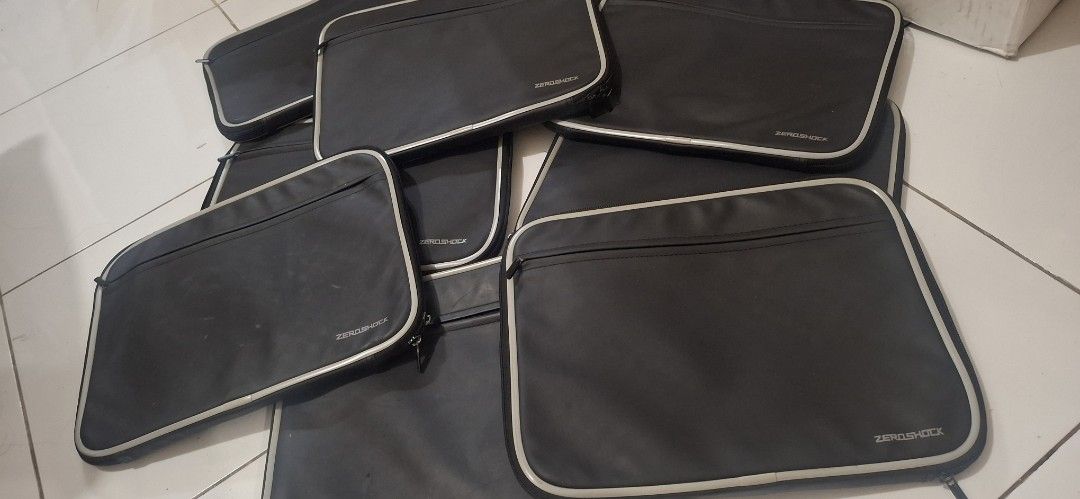 ZeroShock Laptop Sleeve Waterproof Japan (Category: Laptop Bags & Sleeves) located in Manila. Submitted by youngcloud_b1fffa (Listing ID 1433187018, Image 3). Description: - Black laptop sleeve with white trim - Zipper closure - Padded interior for protection - Features the ZeroShock logo - Textured interior - Suitable for tablets or small laptops - Multiple sleeves available "R&B Mix Japan Surplus Items".