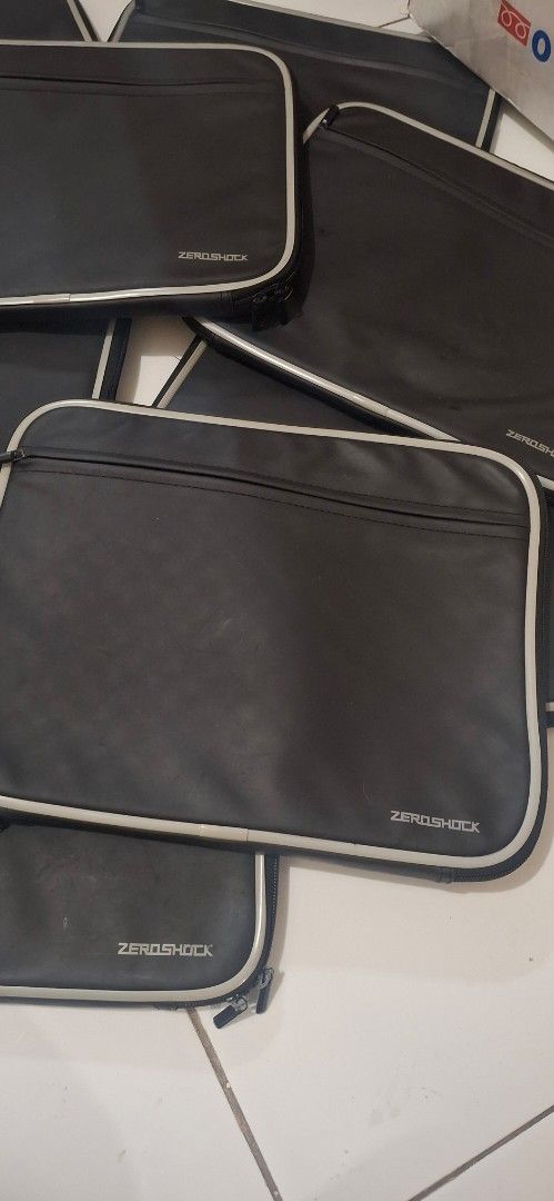 ZeroShock Laptop Sleeve Waterproof Japan (Category: Laptop Bags & Sleeves) located in Manila. Submitted by youngcloud_b1fffa (Listing ID 1433187018, Image 1). Description: - Black laptop sleeve with white trim - Zipper closure - Padded interior for protection - Features the ZeroShock logo - Textured interior - Suitable for tablets or small laptops - Multiple sleeves available "R&B Mix Japan Surplus Items".