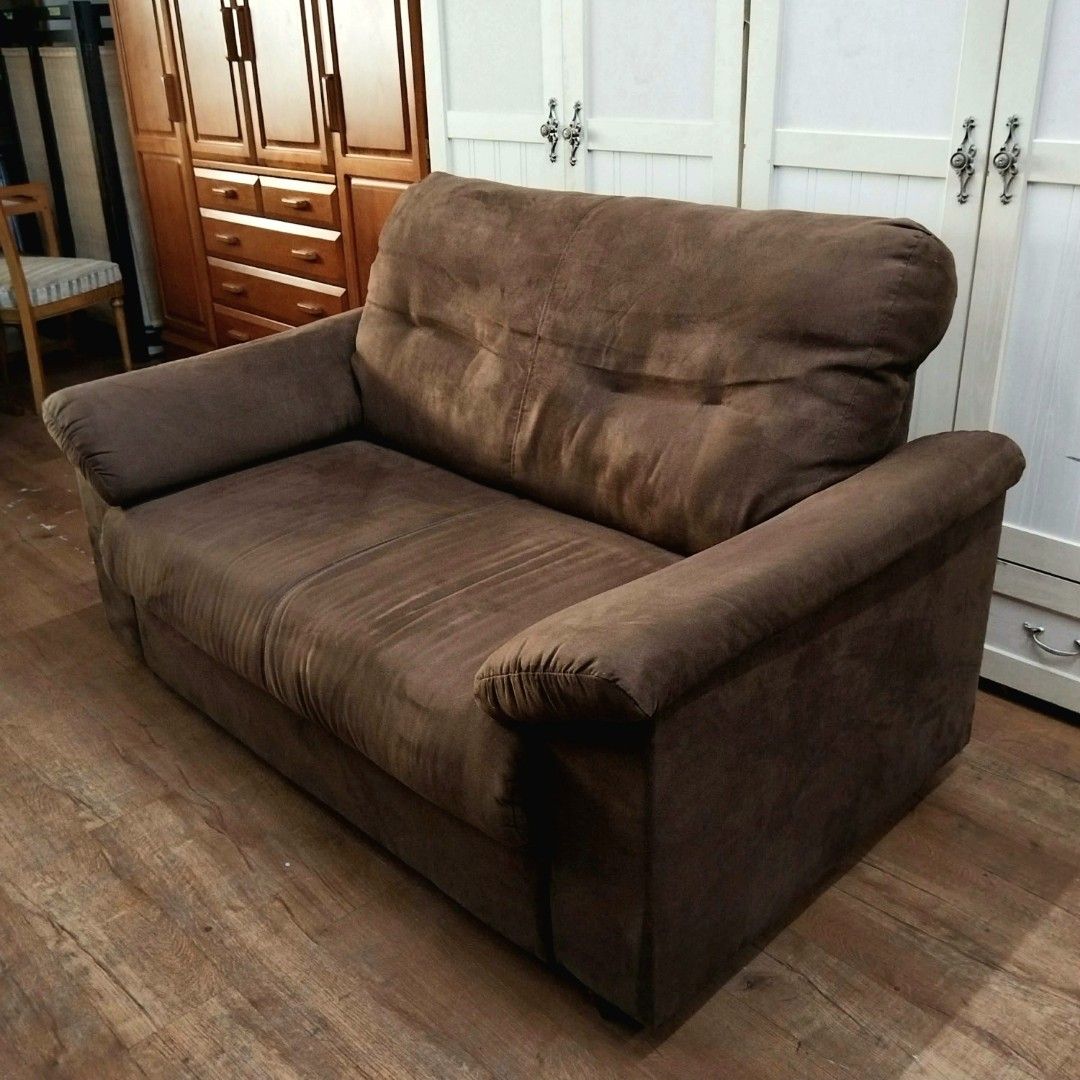 2nd hand Velvet Brown 2-Seater Sofa (Category: Sofas) located in Paranaque City. Submitted by 2ndcharmfurniture (Listing ID 1429749306, Image 3). Description: Comfortable 2-seater sofa in a rich brown color. Features a plush, cushioned design with wide armrests. Dimensions are L146cm, D88cm, H88cm, with a seat height of 42cm. Perfect for living rooms or lounges. The sofa has a sturdy wooden frame..