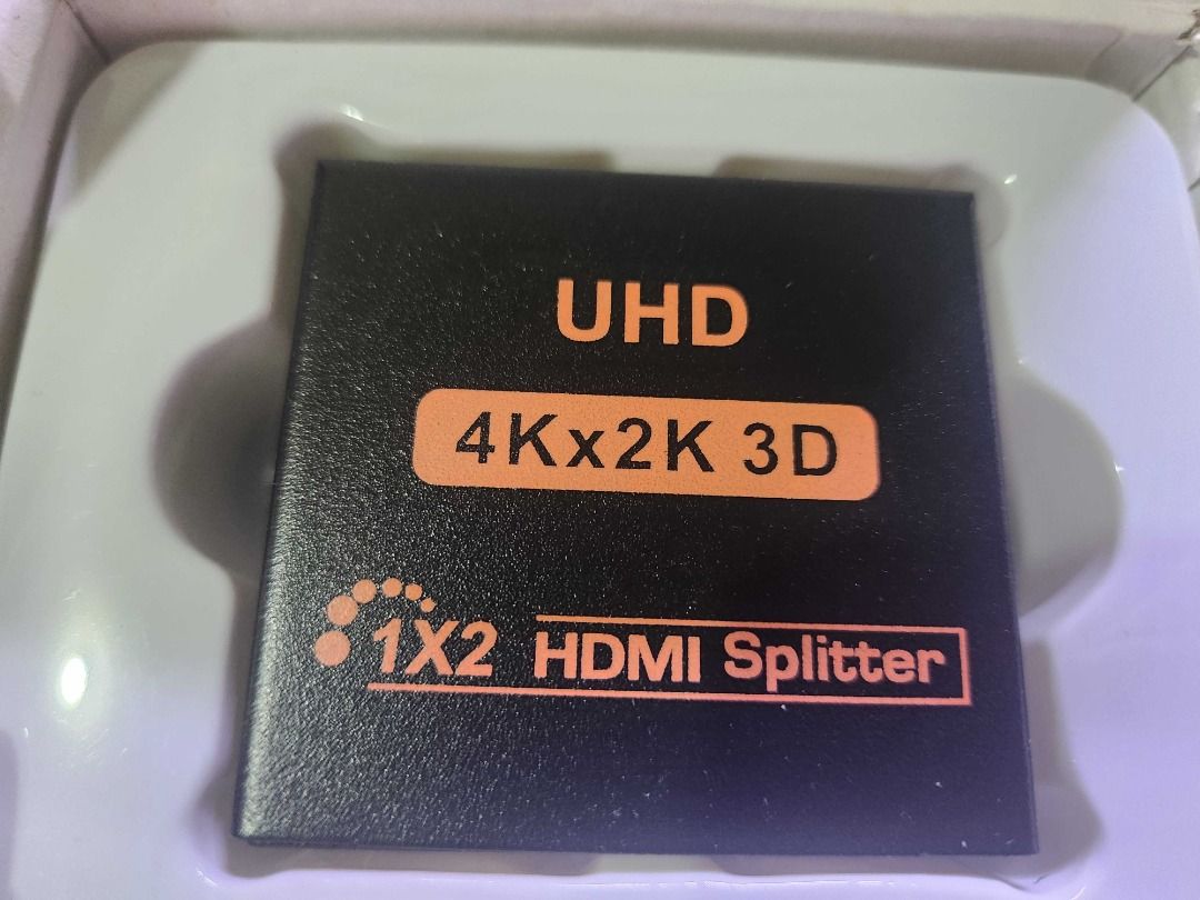 4K X 2K 1X2 HDMI SPLITTER - USED (Category: Cables & Adaptors) located in Manila. Submitted by big_popoi (Listing ID 1429747254, Image 2). Description: Description: HDMI splitter supports 4K x 2K and 3D video. It has one HDMI input and two HDMI outputs. The box indicates it is a 1.4B version. Includes a power adapter. Perfect for connecting multiple displays to a single HDMI source. Condition: Used Reason for selling: I have changed my room setup