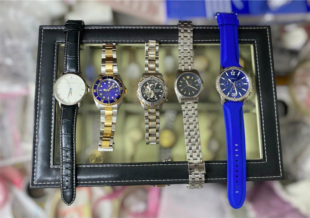 ✨ MEN'S Assorted Watches ✨ (Category: Men's Watches) located in Bulacan. Submitted by shopyourstyleph (Listing ID 1429763004, Image 2). Description: Collection of assorted watches. Includes watches with black leather straps, gold and silver bracelets, and blue silicone straps. Some watches have blue dials, while others have black or white dials. MAESTRO SPADOLINI ITALY TOWN & COUNTRY LUCIANO FORNERIS CARAVELLE.