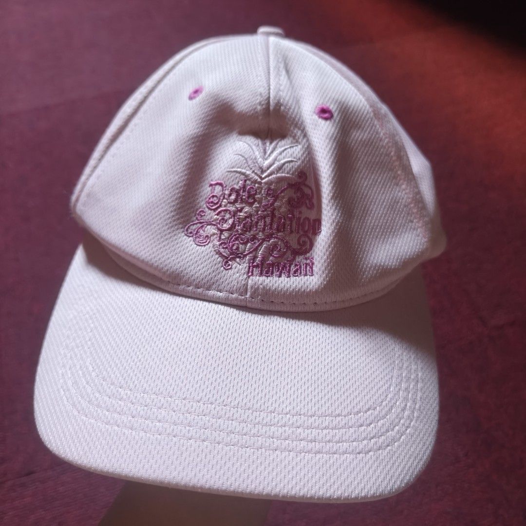 Assorted Caps (Category: Caps & Hats) located in Siniloan. Submitted by wingedwardrobe (Listing ID 1429716195, Image 2). Description: Collection of assorted caps in various styles and colors. Includes a Route 66 cap, a denim cap, a pink cap with a floral design, and a black cap with a textured surface. There is also an Adams Golf visor and a white Under Armour visor. The caps are in different materials and designs..