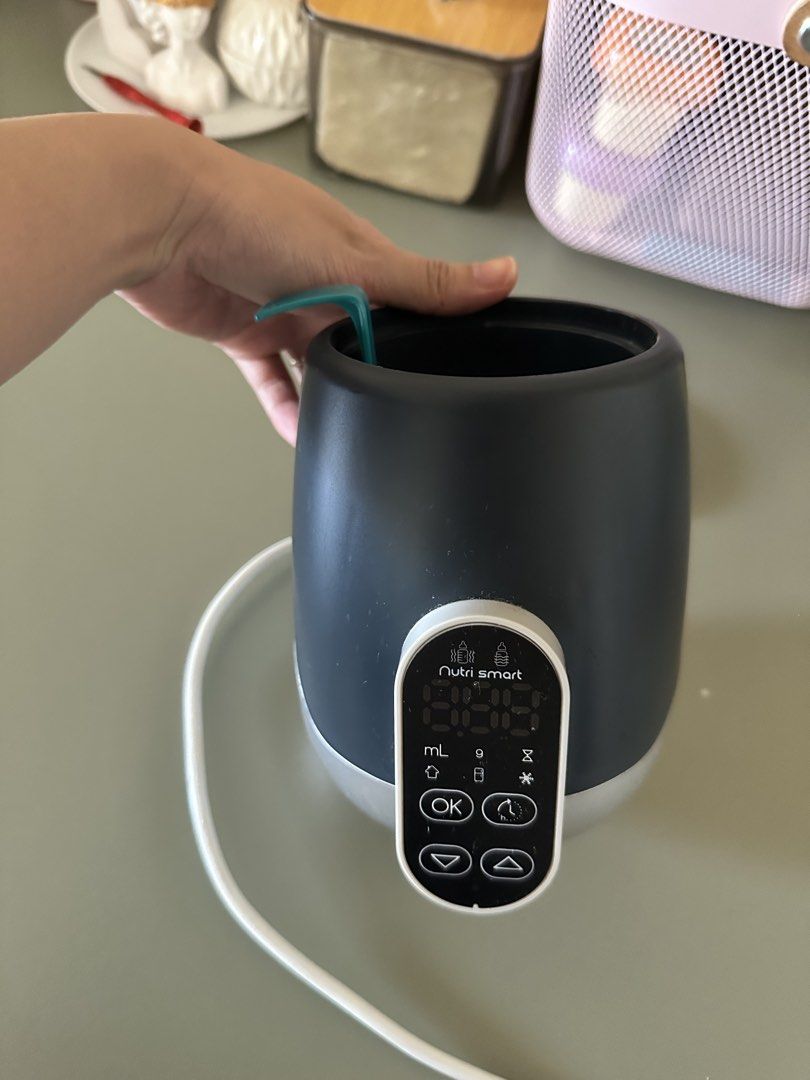 Baby MooV Nutri Smart Bottle Warmer (Category: Breastfeeding & Bottle Feeding) located in Manila. Submitted by declutterbytinnn (Listing ID 1429736412, Image 2). Description: Used it for months only after I gave birth. .