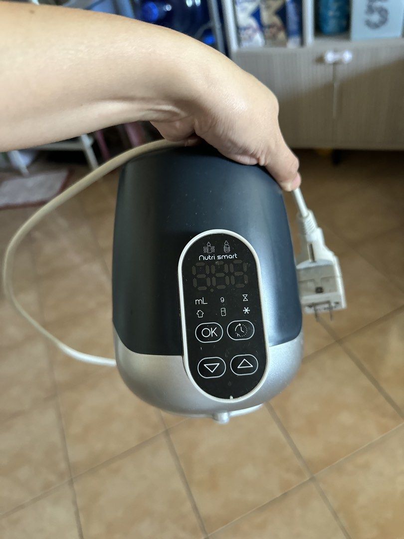 Baby MooV Nutri Smart Bottle Warmer (Category: Breastfeeding & Bottle Feeding) located in Manila. Submitted by declutterbytinnn (Listing ID 1429736412, Image 1). Description: Used it for months only after I gave birth. .