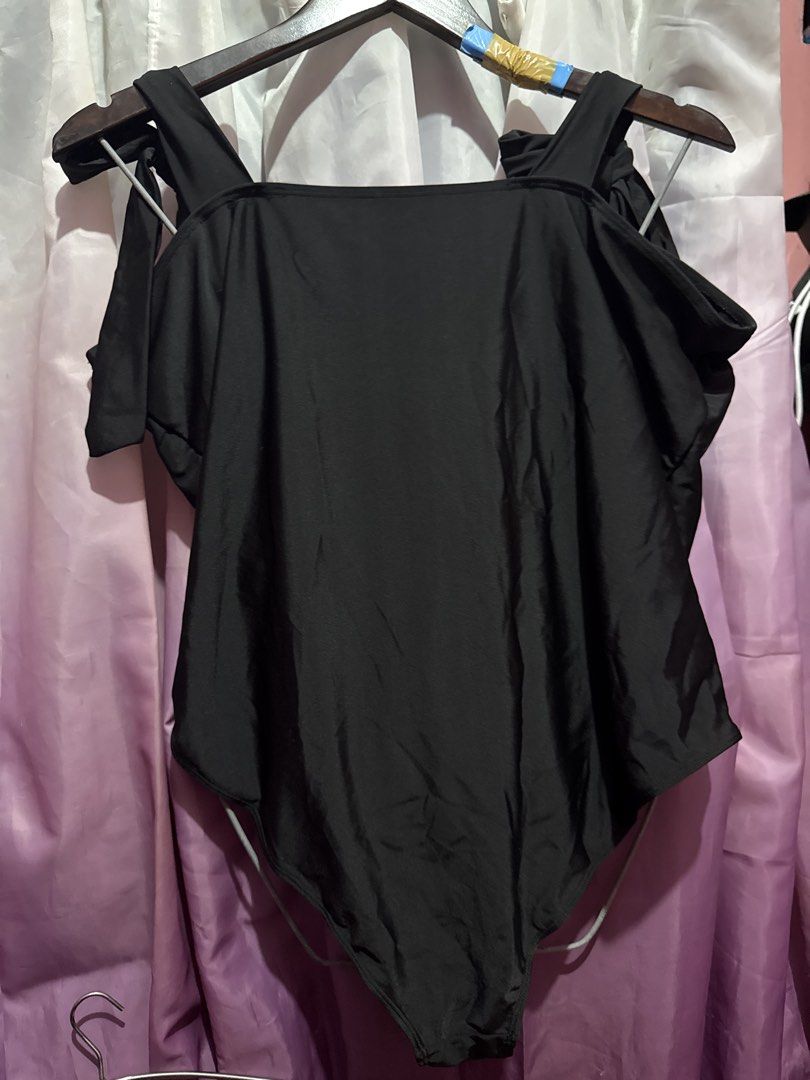 Black One-Piece Swimsuit with Bow Straps (Category: Bikinis & Swimsuits) located in Marikina City. Submitted by kam.declutter (Listing ID 1429831376, Image 3). Description: Hi guys! I’m currently decluttering and I’m selling my pre-loved and never worn clothes. Need na mag bawas super dami na 🥵 📎 color may vary due to lighting 📎 two days reservation only 📎 used but not abused 📎 please manage your expectation 📎 no cancellations of orders 📎 