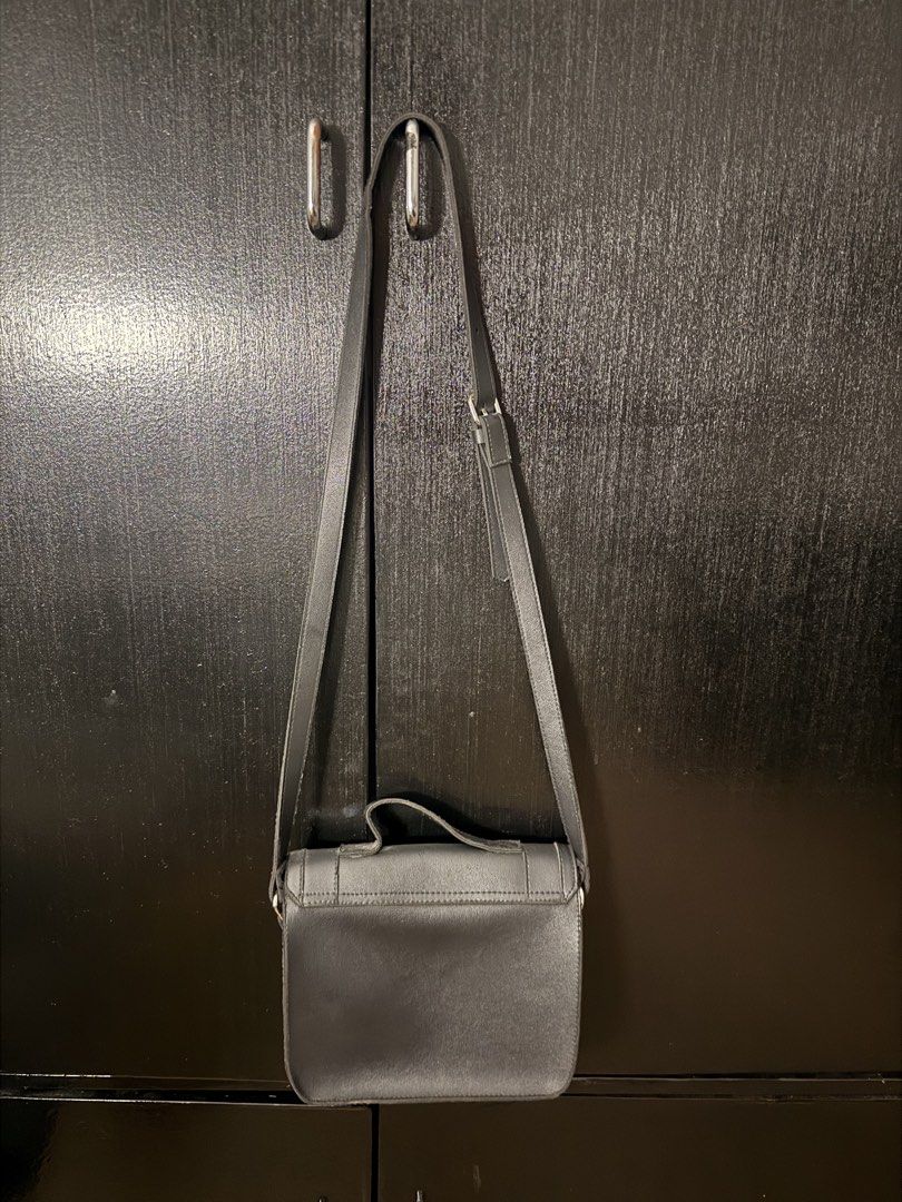 Black Straightforward Bag (Category: Sling Bags) located in Paranaque City. Submitted by jayvee7 (Listing ID 1429802070, Image 2). Description: - Black sling bag - Straightforward design - Durable material - Classic and versatile - Straightforward RFS: Declutterring .