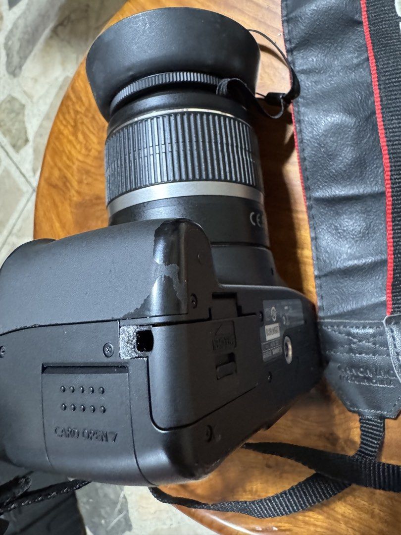 Canon EOS Digital Camera with Lens (Category: Cameras) located in Las Pinas. Submitted by emdjss (Listing ID 1429764596, Image 2). Description: Canon EOS digital camera with lens and strap. Includes a lens hood. Includes a camera strap..