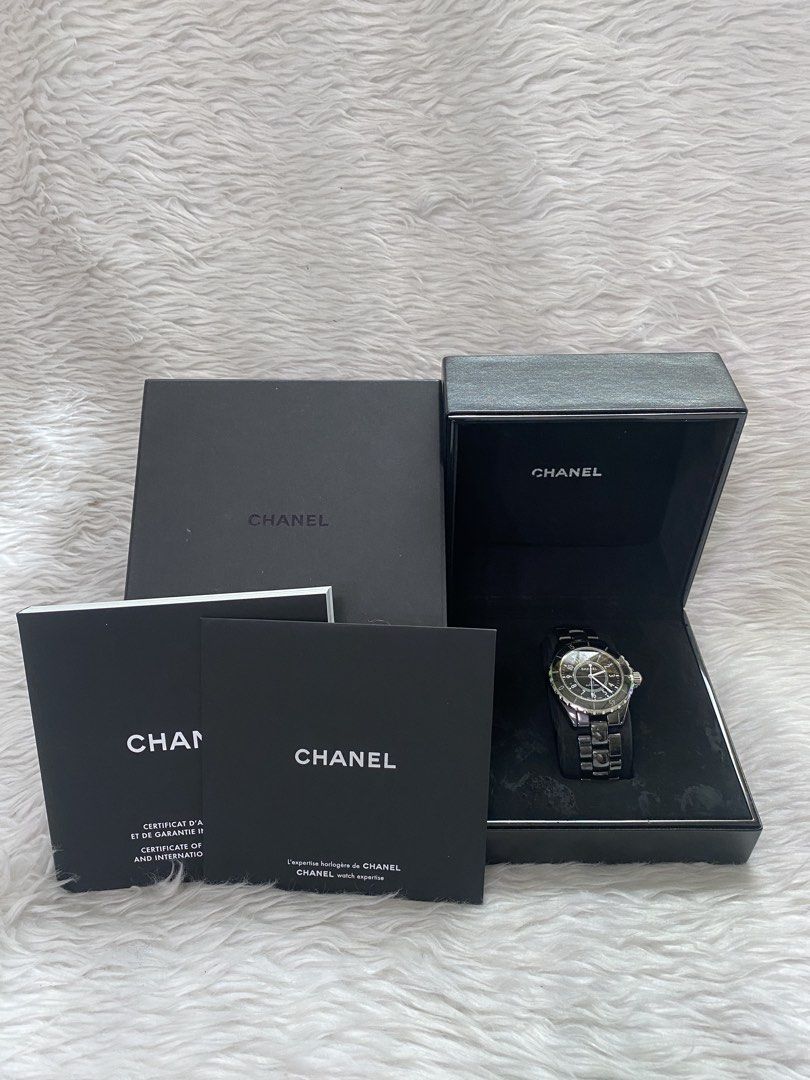 Chanel J12 Automatic Watch (Category: Luxury Watches) located in Malolos. Submitted by yamaguchionline (Listing ID 1429706182, Image 1). Description: Authentic Chanel J12 Automatic watch. Features a black dial with silver-tone hands and markers. The watch has a black ceramic bezel and bracelet. Comes with the original box and papers..