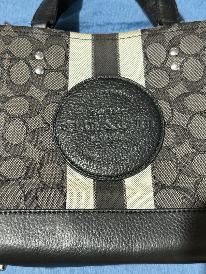 Coach Mini Tote Bag (Category: Luxury Bags & Wallets) located in Makati City. Submitted by iloveprelovedcarla (Listing ID 1429712400, Image 2). Description: Mini tote Needs bag spa Missing sling .