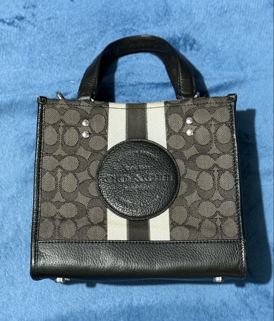 Coach Mini Tote Bag (Category: Luxury Bags & Wallets) located in Makati City. Submitted by iloveprelovedcarla (Listing ID 1429712400, Image 1). Description: Mini tote Needs bag spa Missing sling .