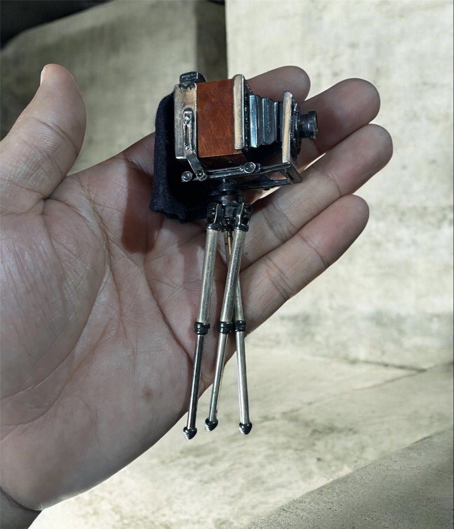 Collectible silver 925 Miniature Camera with Tripod (Category: Cameras) located in Davao. Submitted by john_juan86 (Listing ID 1429680825, Image 2). Description: Silver 925 miniature camera.