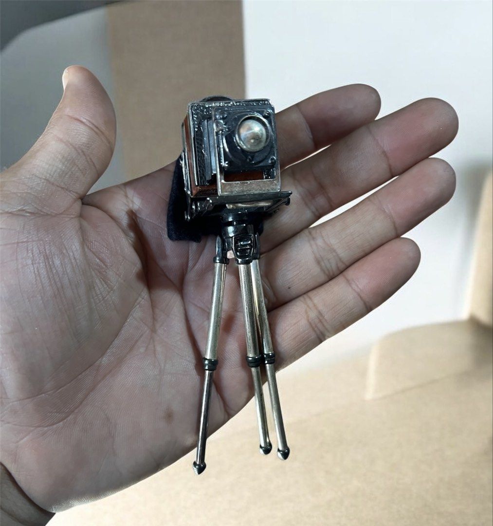 Collectible silver 925 Miniature Camera with Tripod (Category: Cameras) located in Davao. Submitted by john_juan86 (Listing ID 1429680825, Image 1). Description: Silver 925 miniature camera.