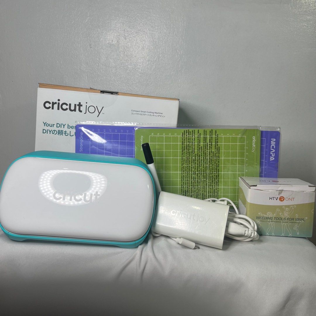 Cricut Joy Compact Cutting Machine and Accessories (Category: Craft Supplies & Tools) located in Manila. Submitted by aaa_bi (Listing ID 1428939013, Image 1). Description: Cricut Joy Compact Cutting Machine and Accessories Bought for 6800, a year ago. What you see is what you get. INCLUSIONS: - Cricut Joy Machine - Blade + Housing - Marker - Used Cricut standard grip mat - Unused NICAPA strong grip mat - Power Adapter - Weeding tools for vinyl: p