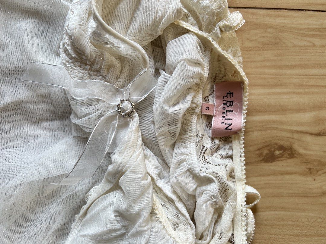 Eblin Lingerie White Babydoll (Category: Undergarments & Loungewear) located in Manila. Submitted by alingmads (Listing ID 1429711900, Image 3). Description: Has 2 flaws. One on the back one on the lower side. See photos for reference. Flaw in back not so noticable due to inner lining. Price negotiable Sf shouldered by buyer.
