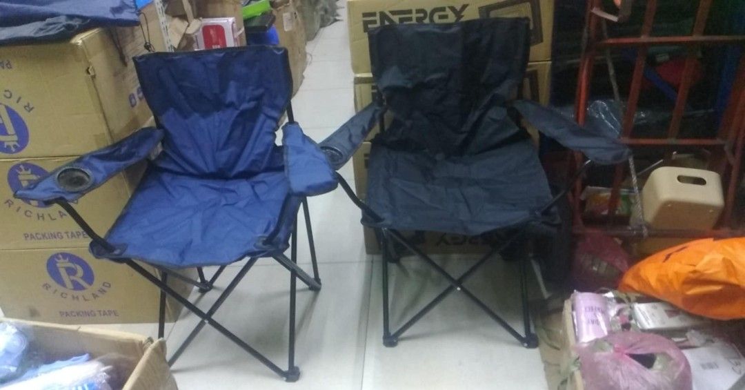 Folding Camping Chair (Category: Chairs) located in Manila. Submitted by yzlshop (Listing ID 1429748410, Image 2). Description: Durable folding camping chairs, perfect for outdoor activities. Features armrests for added comfort. The chairs have a sturdy black frame and a blue fabric seat and back. They appear to be easy to fold and store. Ideal for camping, picnics, or any outdoor event where seating is needed..