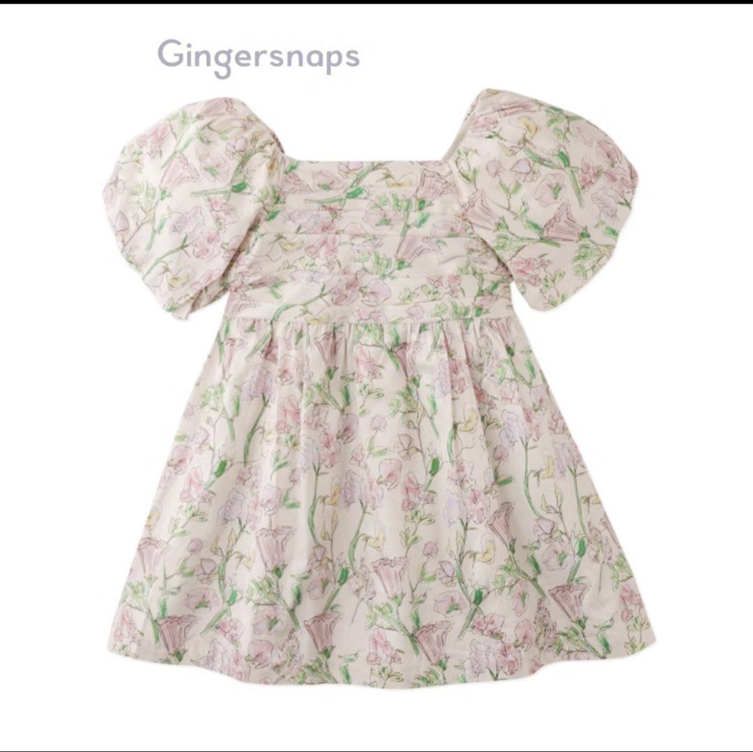 Gingersnaps Floral Dress (Category: Babies & Kids Fashion) located in Manila. Submitted by notsosecretshop (Listing ID 1429817110, Image 1). Description: Adorable dress from Gingersnaps. Features a square neckline and puff sleeves. The dress is adorned with a delicate floral print in shades of pink and green on a cream background. It has a gathered waist and a flared skirt. Perfect for special occasions or everyday wear..
