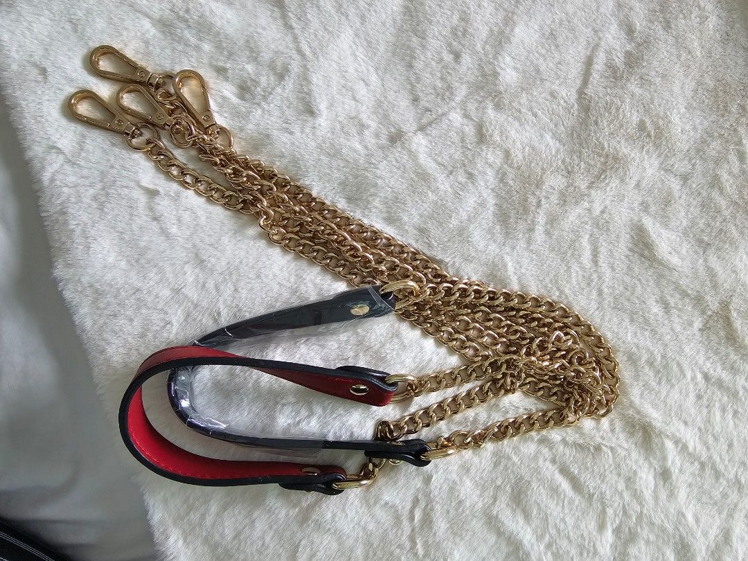 Gold Chain Bag Strap with Leather Handles (Category: Luxury Bags & Wallets) located in Quezon City. Submitted by yourclothesnow (Listing ID 1429811025, Image 1). Description: - Gold chain bag strap - Includes two detachable leather handles: black and red - Features gold-colored clasps for easy attachment - Instantly change the look of your bag all in.