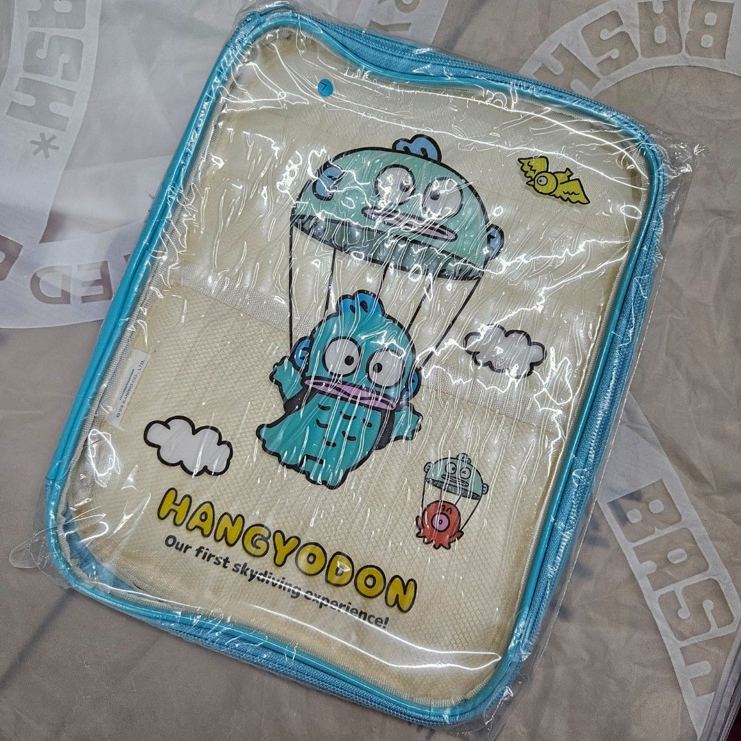 Hangyodon Sationery / iPad Pouch (Category: Stationery & School Supplies) located in Manila. Submitted by cam_c (Listing ID 1429828560, Image 1). Description: has compartments can put stationery condition: 10/10 with tag.