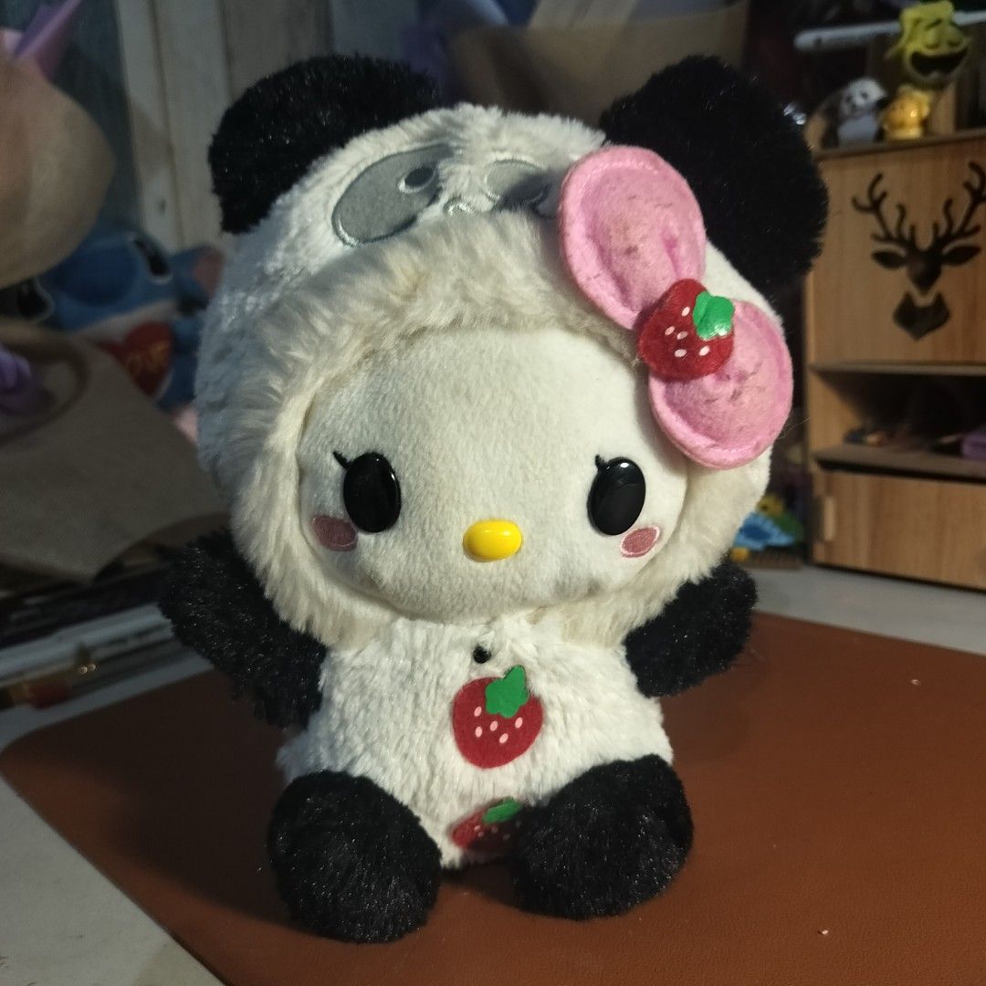 Hello Kitty Hilarious Panda Plushie (Battery Operated) (Category: Plushies & Soft Toys) located in Bocaue. Submitted by chilly.beans (Listing ID 1429752123, Image 1). Description: Not sure if it works but she looks very cute and snuggly 📷💌🐈 -Supposedly laughs when battery is inside the compartment according to Google (I have yet to test if it works, No batteries atm) -Plush itself is in good condition tho -Price Reference from a different sell