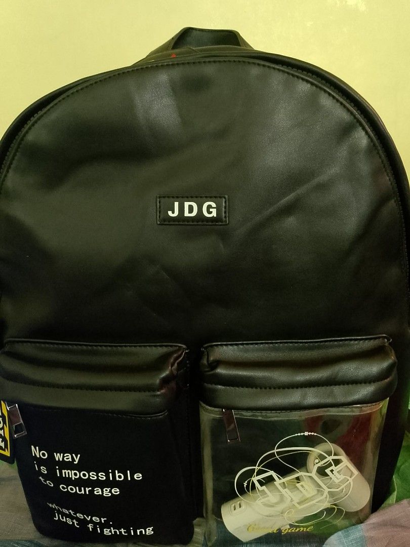 JDG Black Backpack with Multiple Pockets (Category: Backpacks) located in Quezon City. Submitted by annyeong9 (Listing ID 1429812169, Image 1). Description: While this exact JD Gaming (JDG) backpack appears to be a regional or specialty fan item rather than a standard global retail product, similar "Ita-style" or PU leather gaming backpacks. Quite rare. Official Esports Merchandise: While official JDG jerseys and jackets can cost between $50 and 
