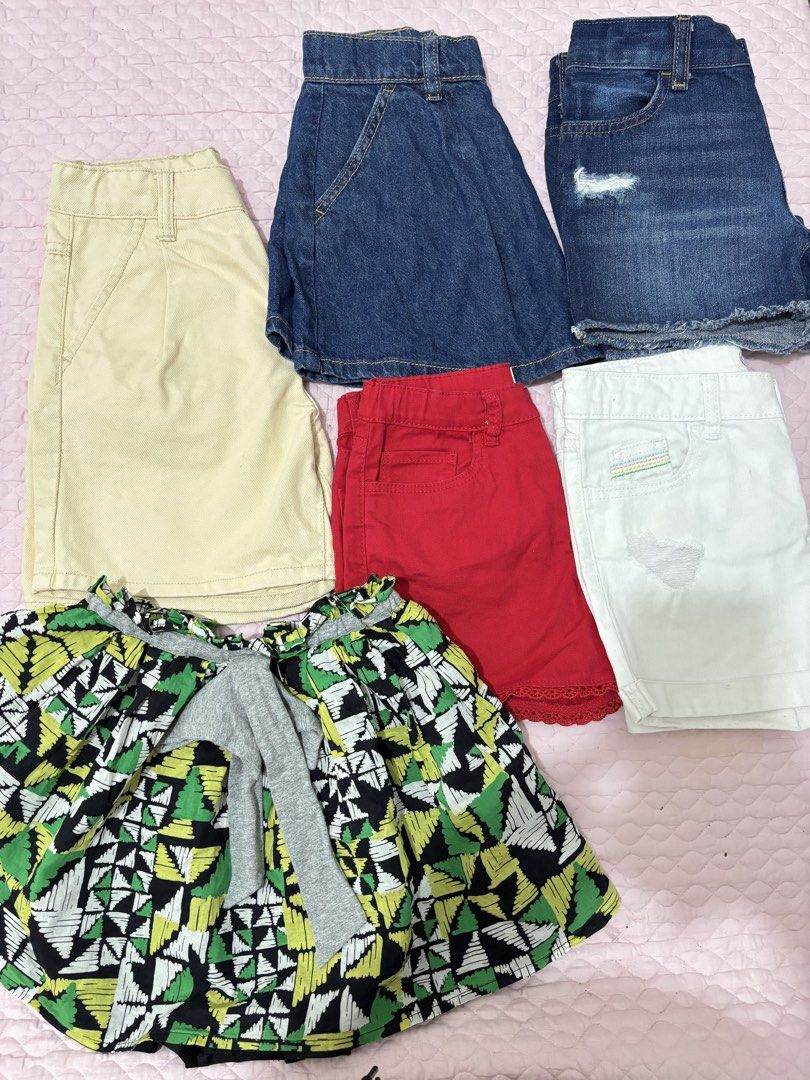 Kids' Shorts and Skirt Bundle (Category: Babies & Kids Fashion) located in Caloocan City. Submitted by kisyabooknerd (Listing ID 1429737938, Image 1). Description: Bundle of kids' shorts and a skirt. Includes a khaki bermuda shorts a denim skirt a pair of denim shorts a red shorts a white shorts a colorful patterned skirt Perfect for everyday wear or play. All well loved Size 8 on tag, will best fit 6-8 (if petite) Will prioritize who will take a