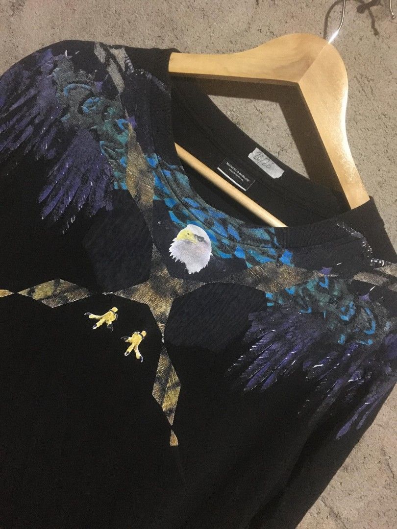 Marcelo Burlon Eagle Graphic T-shirt - Size L (Category: Tshirts & Polo Shirts ) located in Surigao. Submitted by paulcorbeta (Listing ID 1429801075, Image 2). Description: 20/26 excellent condition ✅ issue minimal hairlines 📍MINDANAO,SURIGAO CITY/8400.