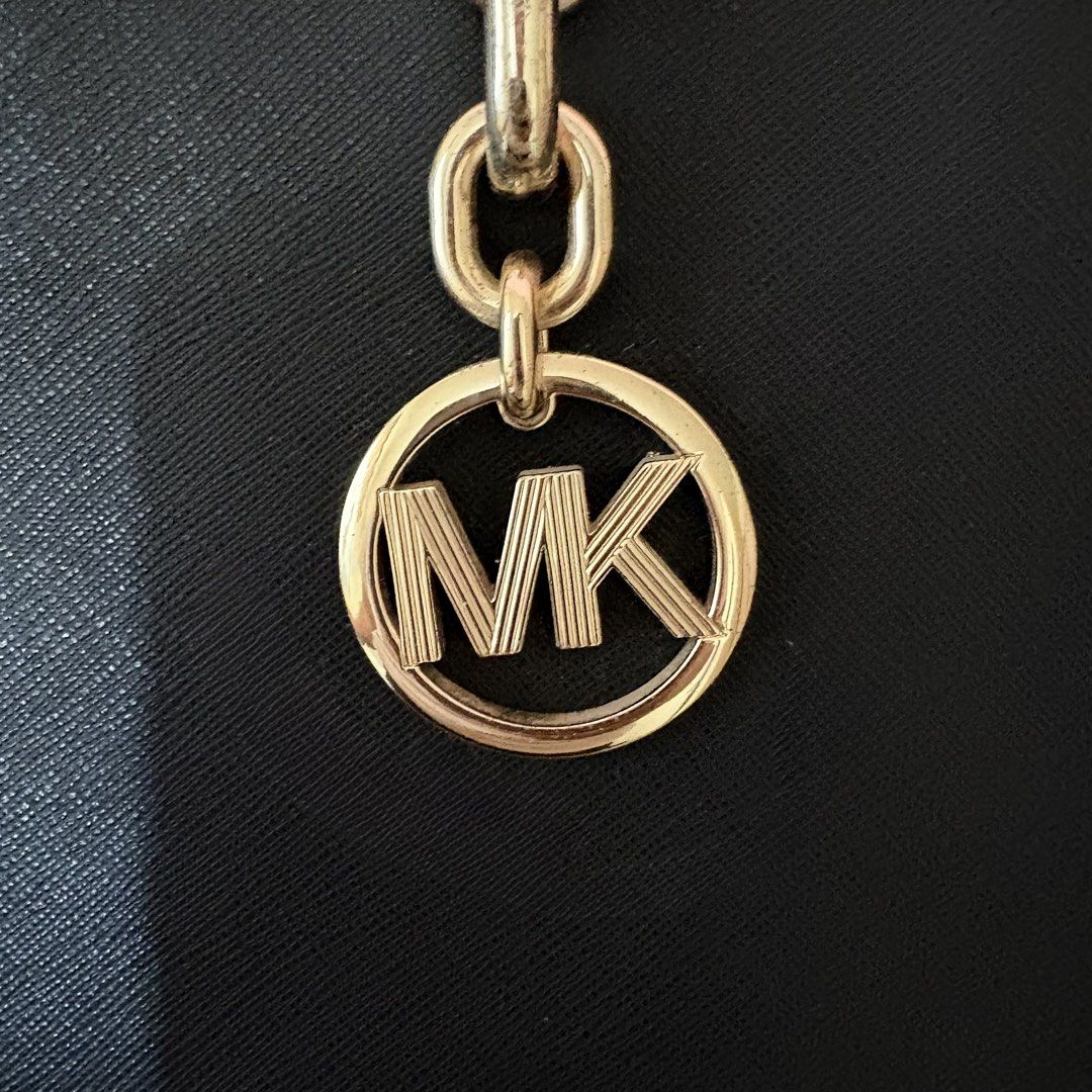 MICHAEL KORS SOFIA LARGE SAFFIANO LEATHER TOTE BAG (BLACK) (Category: Tote Bags) located in Iloilo. Submitted by archivebyn (Listing ID 1429734035, Image 3). Description: FS AUTHENTIC MICHAEL KORS SOFIA LARGE SAFFIANO LEATHER TOTE BAG (BLACK) GOLD-TONE METAL AND BLACK ACETATE CHAIN HANDLES SNAP BUTTON CLOSURE ONLY ISSUE: PAINT CHIPS AND SCRATCHES ON THE BUTTONS AND METAL CHAIN HANDLES DIMENSIONS: 13’’L X 10’’H X 4.5’’W 11’’ Handle Drop SELLING FO