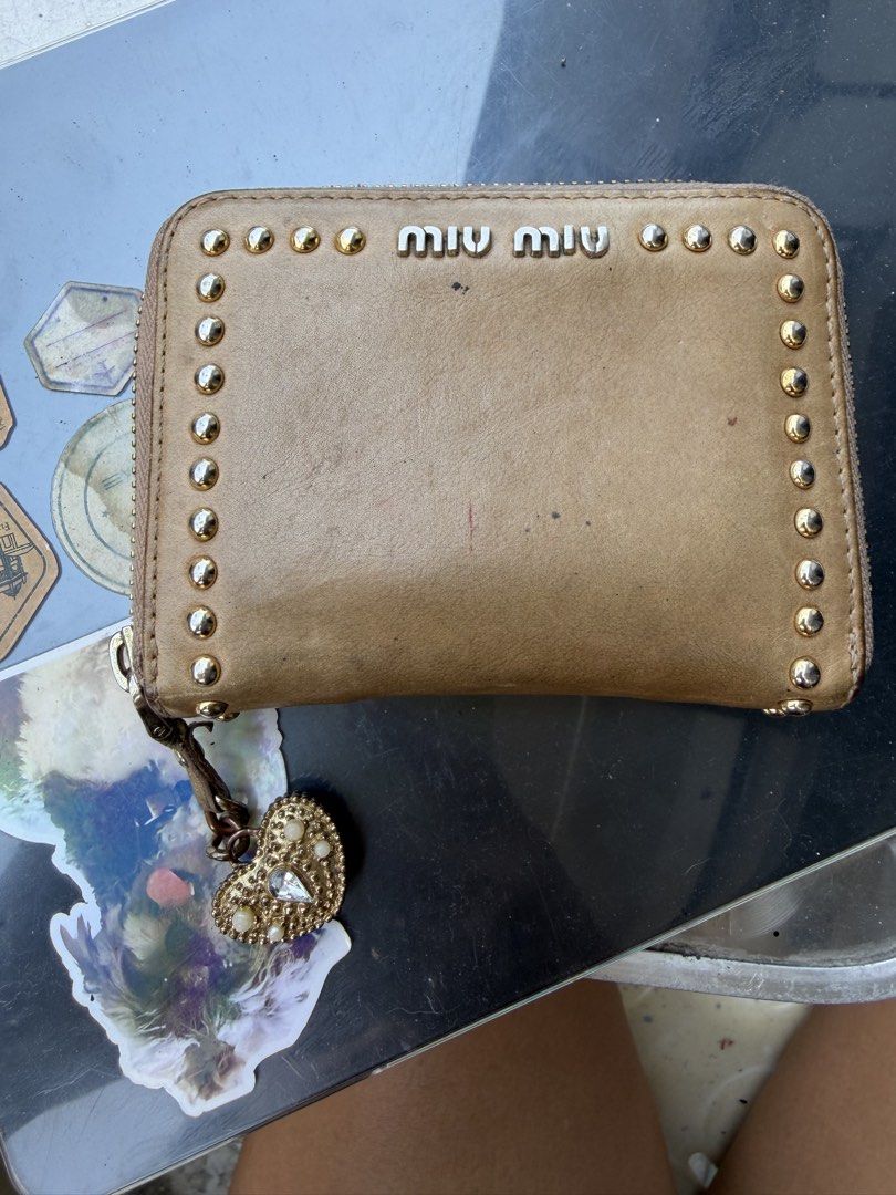 Miu Miu Studded Leather Wallet (Category: Luxury Bags & Wallets) located in Manila. Submitted by fcd2410 (Listing ID 1429699154, Image 1). Description: Sf shouldered by buyer. manage expectations as it is well used .