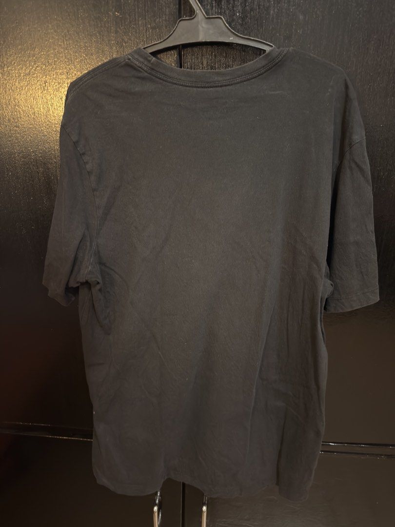 Nike The Nike Tee Black Shirt (Category: Tshirts & Polo Shirts ) located in Paranaque City. Submitted by jayvee7 (Listing ID 1429677440, Image 3). Description: Black Nike T-shirt. Features the Nike logo on the front and "The Nike Tee" text. Made in Sri Lanka. Size M. Simple and versatile, perfect for everyday wear. The shirt is a classic black color, making it easy to pair with various outfits. Size Medium Only used twice Bought in Thailand RFS: 