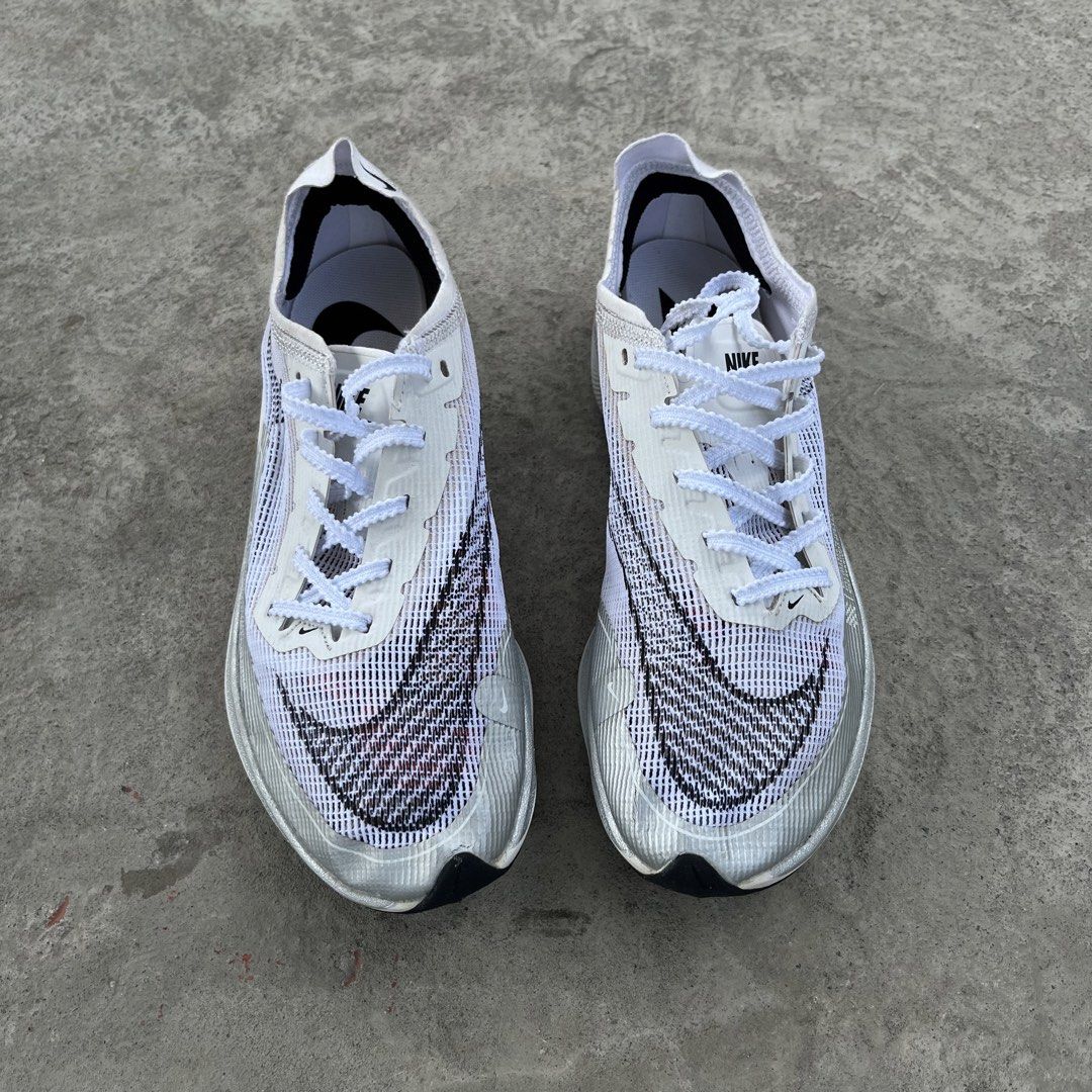 Nike Zoom Vaporfly Next% 2 White (Category: Sneakers) located in Palo. Submitted by emman_dags (Listing ID 1429794124, Image 1). Description: Nike ZoomX Vaporfly Next% 2 Color way: White Metallic Silver Size: 7.5US | 5UK | 38.5EUR | 24.5CM Issue: minimal sign of usage Excellent condition Price: ₱1,999 + sf📩.