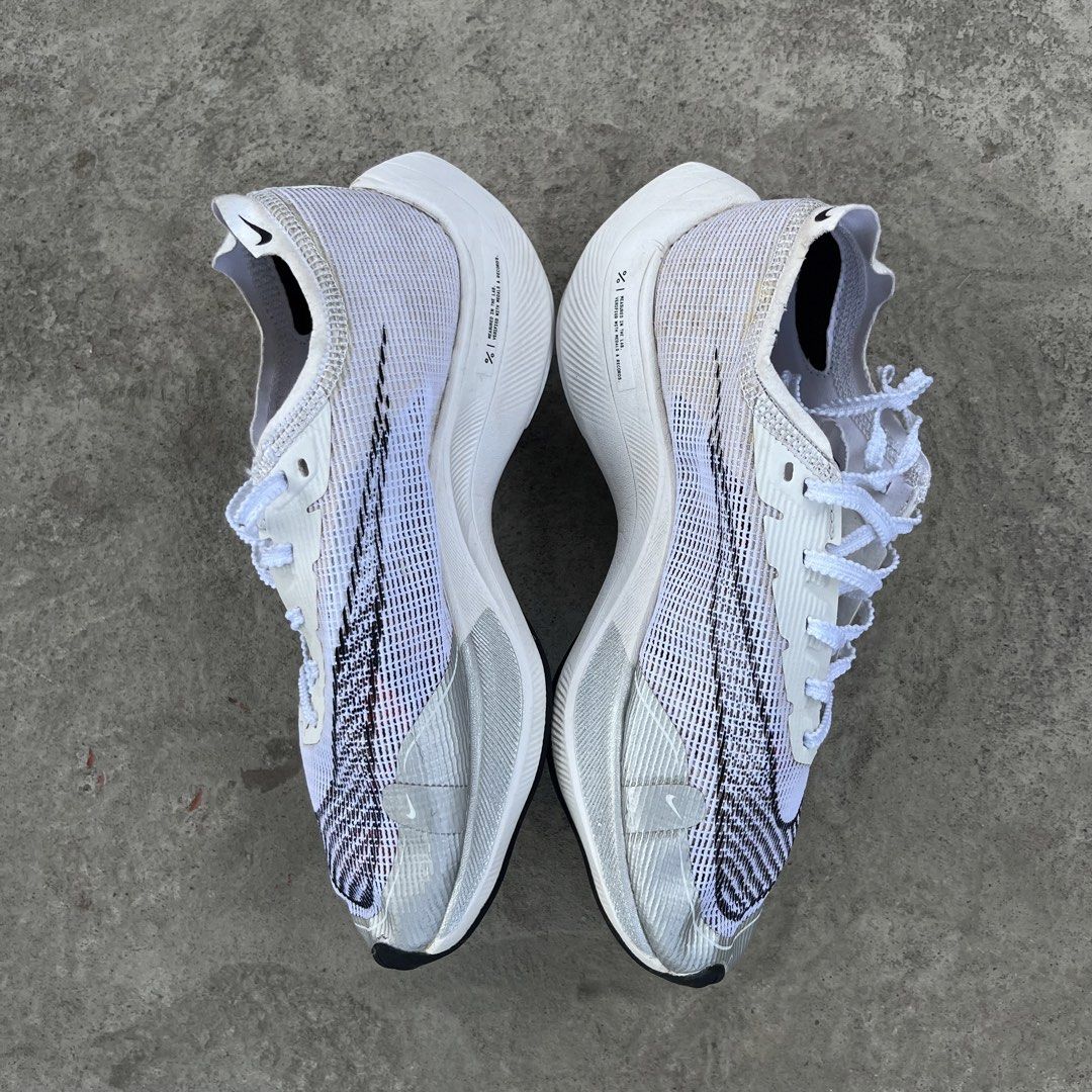 Nike Zoom Vaporfly Next% 2 White (Category: Sneakers) located in Palo. Submitted by emman_dags (Listing ID 1429794124, Image 2). Description: Nike ZoomX Vaporfly Next% 2 Color way: White Metallic Silver Size: 7.5US | 5UK | 38.5EUR | 24.5CM Issue: minimal sign of usage Excellent condition Price: ₱1,999 + sf📩.