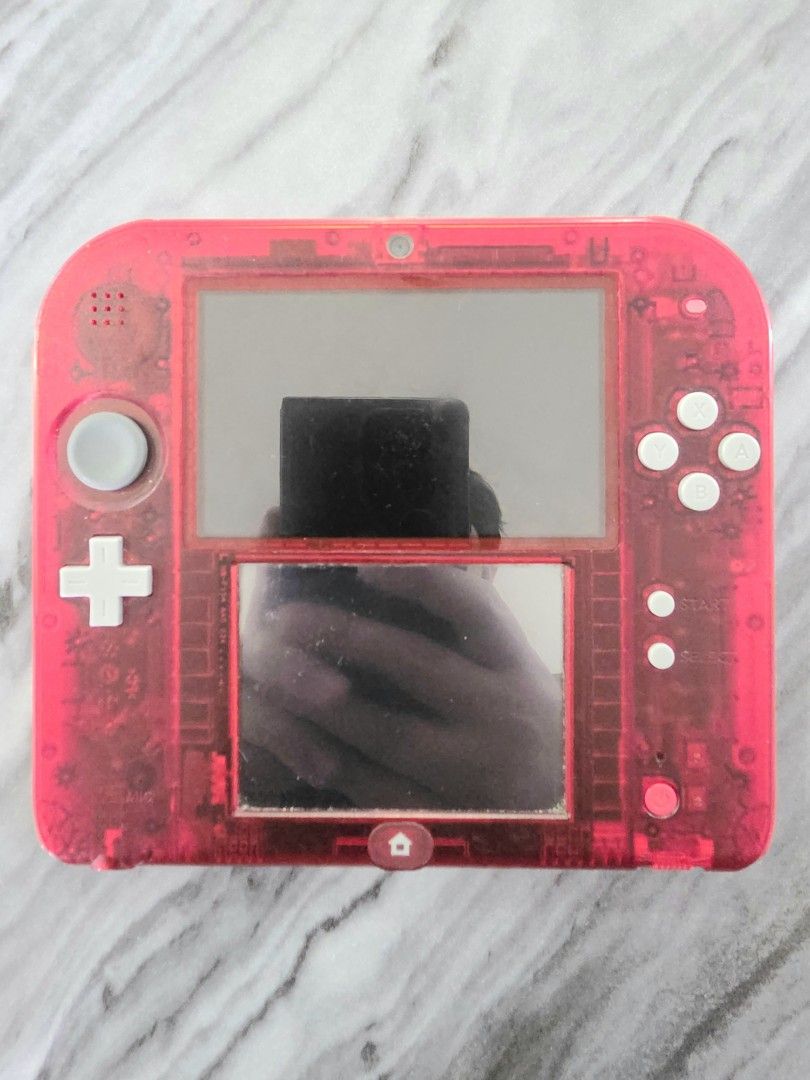 Nintendo 2DS Transparent Red Non-CFW Rare (Category: Nintendo) located in Mandaluyong City. Submitted by chan.ningtatum (Listing ID 1429819651, Image 2). Description: For Sale! Nintendo 2DS Transparent Red US Version !! Non-CFW !! Good Working Condition. No Issue. Rare 2DS Version. Checkouts via Shope e and Laz ada Available Shipping: Lalamove, Grab Meet ups: Mandaluyong and San Juan City..