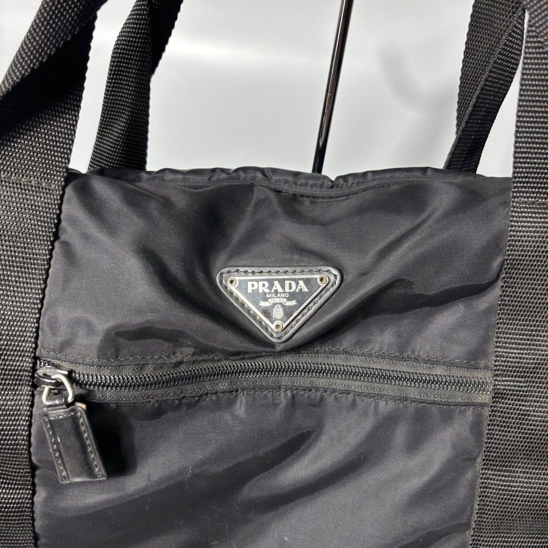 PRADA DUFFLE BAG (Category: Luxury Bags & Wallets) located in Iloilo. Submitted by tahimikgumalaw1of1 (Listing ID 1429818962, Image 3). Description: PRADA DUFFLE BAG XLarge Excellent Flaws see pic 2,500.