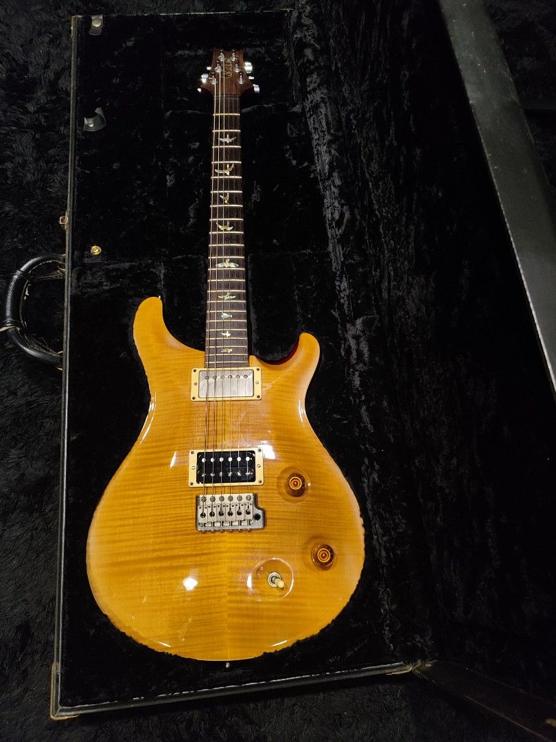 PRS Custom 22 Artist 1994 (Category: Musical Instruments) located in Manila. Submitted by jasoncammayo (Listing ID 1429711456, Image 2). Description: For sale only no trade, with complete papers and hardcase. Annapolis-era hand-built The bridge pick up is changed to bare knuckle but the original is available, the bare knuckle is included in the purchase. Body & Construction Body Material: Mahogany back with a Carved Artist-Grade Figured Maple top