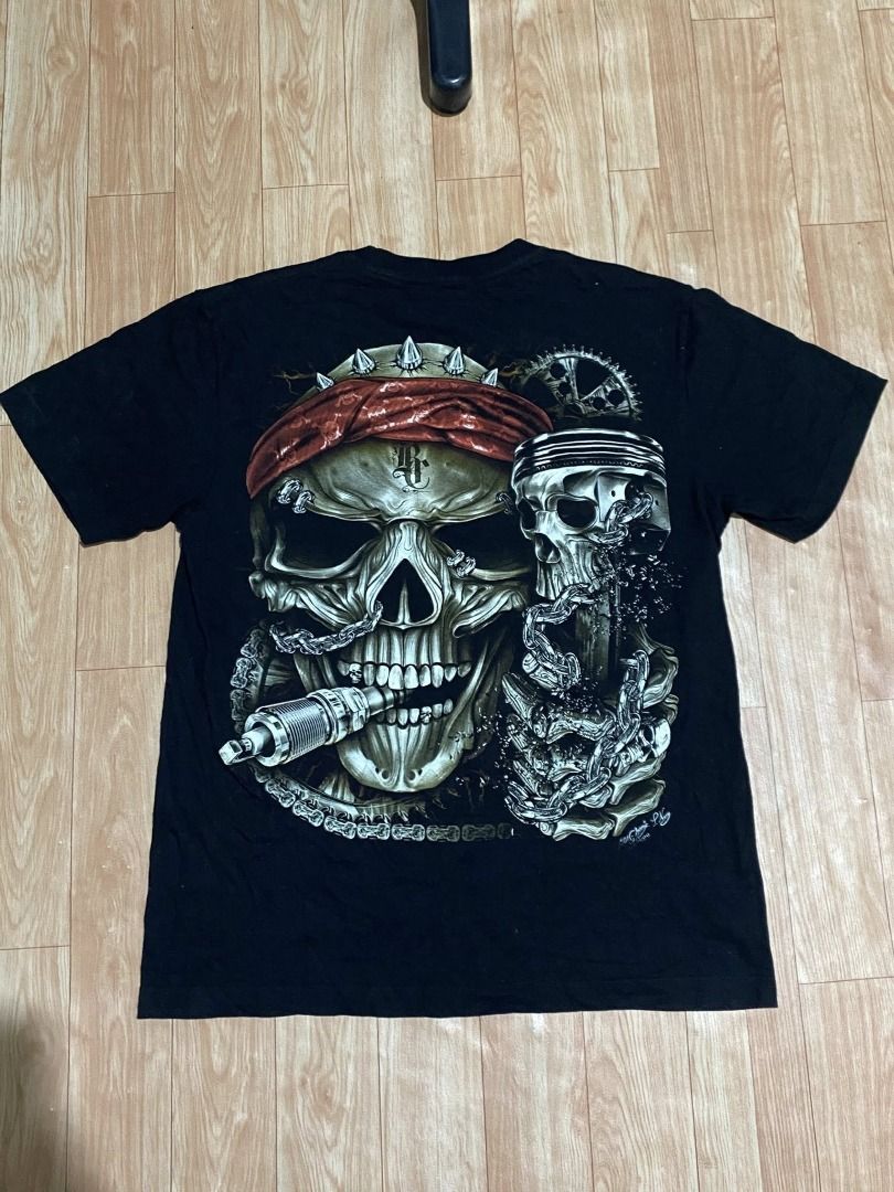 (Rock Chang) Skull Born to Ride (Category: Tshirts & Polo Shirts ) located in Calasiao. Submitted by dr.ginoo (Listing ID 1429815113, Image 2). Description: - Rock Chang Skull Born to Ride T-shirt - Black color - Features a detailed skull graphic - Design includes a skull with a red bandana, chains, and spark plug - issue : cut tags - minimal hair lines.